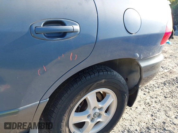 2003 Hyundai Santa Fe GLS with VIN KM8SC73D33U469955, listed as a IAAI auction lot 41989360 with 66,798 mi miles. Bid and sale history available at carsss.com. Image 13.