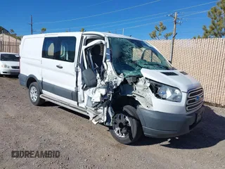 2016 Ford Transit Cargo with VIN 1FTYR1ZM9GKB20351, listed as a IAAI auction lot 38864121 with 99,365 mi miles and . Bid and sale history available at DreamBid. Image 1.