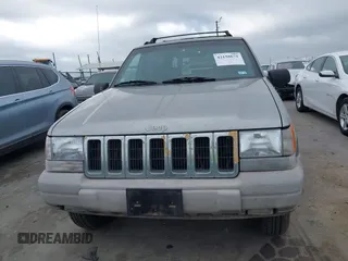 1998 Jeep Grand Cherokee Laredo with VIN 1J4FX58S6WC354101, listed as a IAAI auction lot 42158671 with 289,318 mi miles and . Bid and sale history available at DreamBid. Image 6.