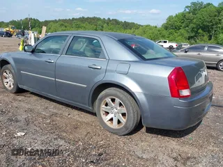 2007 Chrysler 300 with VIN 2C3LA43R07H860986, listed as a IAAI auction lot 42162490 with 117,334 mi miles. Bid and sale history available at carsss.com. Image 3.