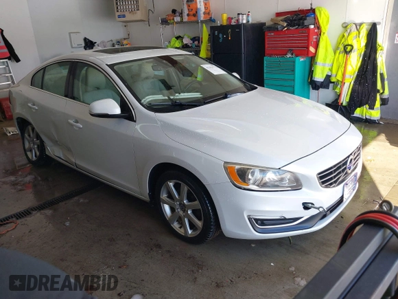 2016 Volvo S60 T5 Drive-E Premier with VIN YV126MFKXG2410966, listed as a IAAI auction lot 41308772 with 262,816 mi miles. Bid and sale history available at carsss.com. Image 1.