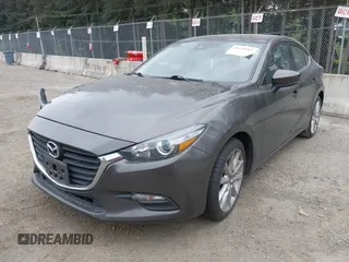 2017 Mazda 3 Touring with VIN 3MZBN1V73HM118104, listed as a IAAI auction lot 42139361 with 71,615 mi miles and . Bid and sale history available at DreamBid. Image 2.