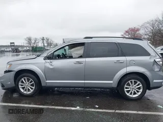 2016 Dodge Journey SXT with VIN 3C4PDDBG7GT173158, listed as a IAAI auction lot 42020182 with 159,136 mi miles. Bid and sale history available at carsss.com. Image 14.