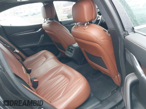 2017 Maserati Ghibli with VIN ZAM57XSA3H1197716, listed as a IAAI auction lot 41918916 with 47,779 mi miles. Bid and sale history available at carsss.com. Image 8.