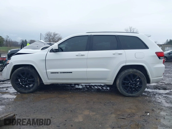 2017 Jeep Grand Cherokee Altitude with VIN 1C4RJFAG9HC946689, listed as a IAAI auction lot 41994538 with 123,339 mi miles and . Bid and sale history available at DreamBid. Image 14.