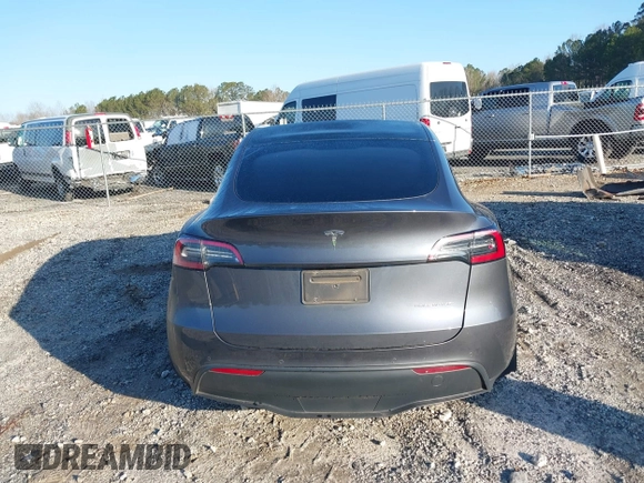 2022 Tesla Model Y Long Range with VIN 7SAYGAEE6NF361883, listed as a IAAI auction lot 41752441 with 50,493 mi miles and . Bid and sale history available at DreamBid. Image 16.