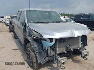 2022 Ford F-150 XL with VIN 1FTFW1E52NFA73233, listed as a IAAI auction lot 42311048 with 14,298 mi miles and . Bid and sale history available at DreamBid. Image 1.