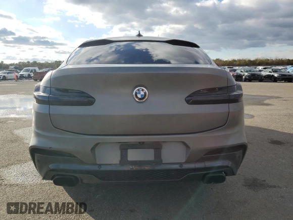 2021 BMW X4 M40i z VIN 5UX2V5C08M9F52562, wystawiony jako Copart lot #83665674 z przebiegiem Nie podano mil oraz Szkoda całkowita • Salvage title. Historia ofert i sprzedaży dostępna na DreamBid. Obrazek 6.