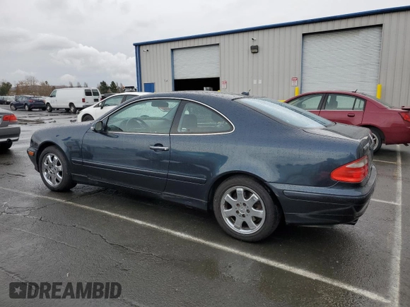 2000 Mercedes-Benz CLK 320/430 with VIN WDBLJ65GXYF158128, listed as a Copart auction lot 85065964 with 244,551 mi miles and Salvage Title. Bid and sale history available at DreamBid. Image 2.