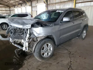 2014 Jeep Grand Cherokee Laredo with VIN 1C4RJFAG1EC393161, listed as a Copart auction lot 50611655 with 129,339 mi miles and Salvage Title. Bid and sale history available at carsss.com. Image 1.