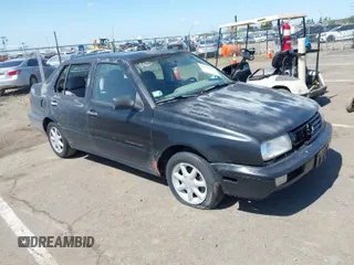 1998 Volkswagen Jetta z VIN 3VWSB81H9WM116760, wystawiony jako IAAI lot #41919493 z przebiegiem 262 461 mil mil oraz . Historia ofert i sprzedaży dostępna na DreamBid. Obrazek 1.