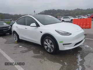 2023 Tesla Model Y Long Range z VIN 7SAYGDEE9PA069095, wystawiony jako IAAI lot #41986700 z przebiegiem 19 484 mil mil oraz . Historia ofert i sprzedaży dostępna na DreamBid. Obrazek 1.