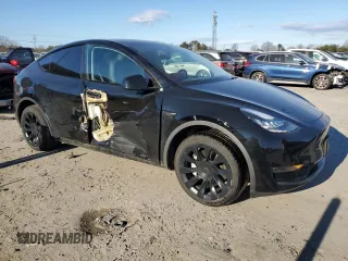 2023 Tesla Model Y Long Range with VIN 7SAYGDEEXPA078937, listed as a Copart auction lot 47095285 with 28,521 mi miles and Salvage Title. Bid and sale history available at DreamBid. Image 4.