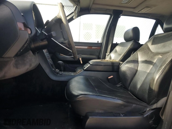 1995 Mercedes-Benz S with VIN WDBGA43E9SA233994, listed as a Copart auction lot 65867264 with 655,674 mi miles and Salvage Title. Bid and sale history available at DreamBid. Image 7.