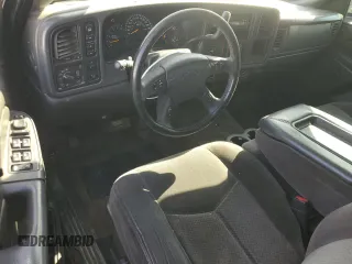 2005 Chevrolet Silverado 1500 LT with VIN 2GCEK13TX51247047, listed as a Copart auction lot 52769025 with 201,593 mi miles and Salvage Title. Bid and sale history available at DreamBid. Image 8.