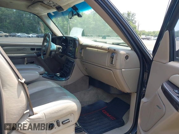 2002 GMC Yukon Denali z VIN 1GKEK63U82J189550, wystawiony jako IAAI lot #42416885 z przebiegiem 209 115 mil mil oraz . Historia ofert i sprzedaży dostępna na DreamBid. Obrazek 5.