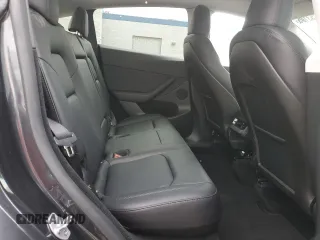 2024 Tesla Model Y Performance z VIN 7SAYGDEF5RF125127, wystawiony jako Copart lot #56753105 z przebiegiem 9 267 mil mil oraz Szkoda całkowita • Salvage title. Historia ofert i sprzedaży dostępna na DreamBid. Obrazek 10.