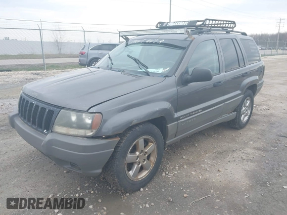 2002 Jeep Grand Cherokee Laredo with VIN 1J4GW48S92C294116, listed as a IAAI auction lot 42080375 with 154,108 mi miles and . Bid and sale history available at DreamBid. Image 2.
