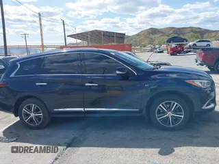 2016 Infiniti QX60 with VIN 5N1AL0MNXGC520860, listed as a IAAI auction lot 41955662 with 165,716 mi miles. Bid and sale history available at carsss.com. Image 13.