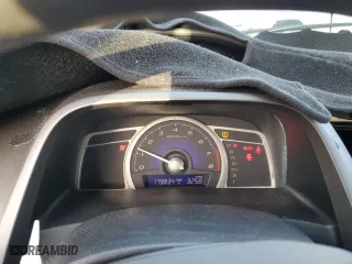 2010 Honda Civic Sdn LX with VIN 2HGFA1F55AH577203, listed as a Copart auction lot 53259215 with 179,834 mi miles and Salvage Title. Bid and sale history available at carsss.com. Image 9.