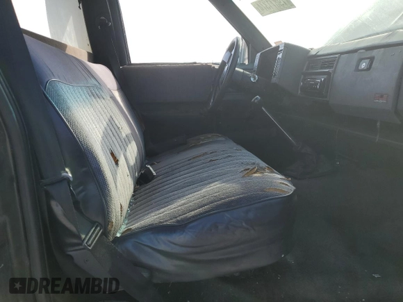 1991 GMC Sonoma with VIN 1GTCS14RXM2559524, listed as a Copart auction lot 79871374 with 228,691 mi miles and Salvage Title. Bid and sale history available at DreamBid. Image 7.