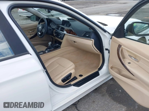 2014 BMW 3 Series 328i xDrive with VIN WBA3G7C55EKN37528, listed as a IAAI auction lot 42031076 with 55,627 mi miles and . Bid and sale history available at carsss.com. Image 5.