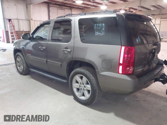 2011 GMC Yukon SLT with VIN 1GKS2CE07BR213141, listed as a IAAI auction lot 41674842 with 226,151 mi miles. Bid and sale history available at carsss.com. Image 3.