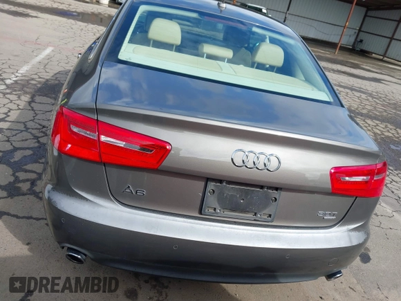 2013 Audi A6 Premium Plus z VIN WAUGGAFC8DN077982, wystawiony jako IAAI lot #41783832 z przebiegiem 95 981 mil mil oraz . Historia ofert i sprzedaży dostępna na DreamBid. Obrazek 17.