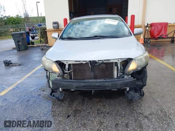 2013 Toyota Corolla L with VIN 5YFBU4EE7DP209207, listed as a IAAI auction lot 41990086 with 168,269 mi miles. Bid and sale history available at carsss.com. Image 6.