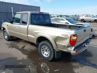 2002 Mazda B-Series 2WD Truck DS with VIN 4F4YR16U52TM18118, listed as a IAAI auction lot 41563022 with 126,136 mi miles. Bid and sale history available at carsss.com. Image 3.