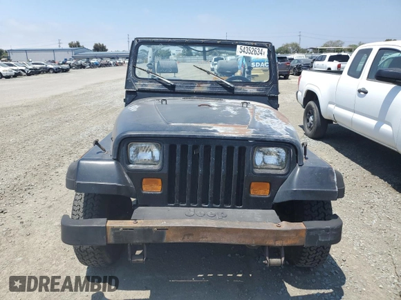 1990 Jeep Wrangler with VIN 2J4FY29T8LJ541585, listed as a Copart auction lot 54352634 with 138,022 mi miles and Salvage Title. Bid and sale history available at carsss.com. Image 5.