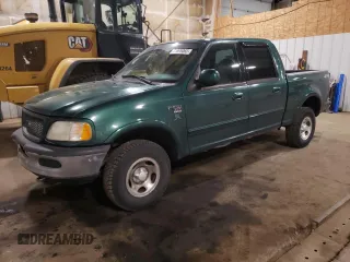 2001 Ford F-150 XLT z VIN 1FTRW08W41KD98737, wystawiony jako Copart lot #64695065 z przebiegiem 179 158 mil mil oraz Czysty tytuł • Clean title. Historia ofert i sprzedaży dostępna na DreamBid. Obrazek 1.