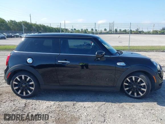 2020 MINI Hardtop Cooper S z VIN WMWXR5C07L2L55038, wystawiony jako IAAI lot #42031685 z przebiegiem 20 629 mil mil oraz . Historia ofert i sprzedaży dostępna na DreamBid. Obrazek 13.