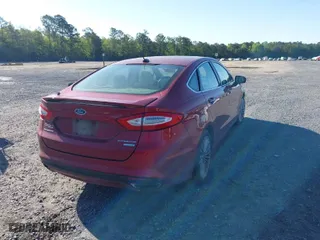 2016 Ford Fusion Titanium with VIN 3FA6P0K94GR373415, listed as a IAAI auction lot 41971956 with 116,654 mi miles. Bid and sale history available at carsss.com. Image 4.