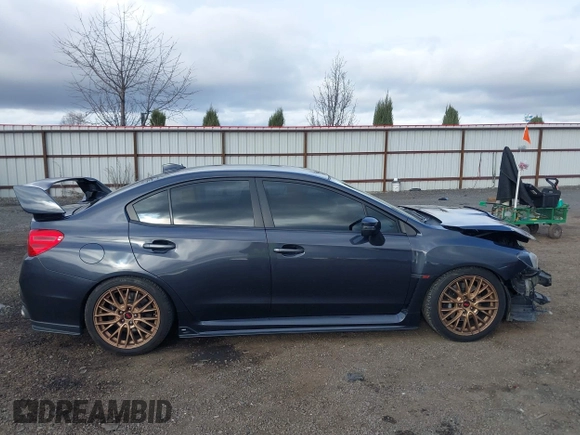 2016 Subaru WRX STI z VIN JF1VA2V65G9819805, wystawiony jako IAAI lot #41894754 z przebiegiem 54 722 mil mil oraz . Historia ofert i sprzedaży dostępna na DreamBid. Obrazek 14.