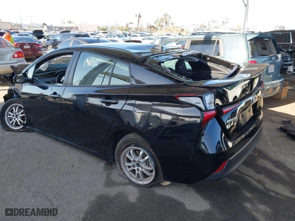 2021 Toyota Prius L Eco with VIN JTDKAMFU2M3134178, listed as a IAAI auction lot 41975477 with 26,936 mi miles. Bid and sale history available at carsss.com. Image 3.