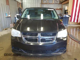 2012 Dodge Grand Caravan SXT with VIN 2C4RDGCG0CR340868, listed as a Copart auction lot 85560274 with 242,089 mi miles and Clean Title. Bid and sale history available at DreamBid. Image 5.