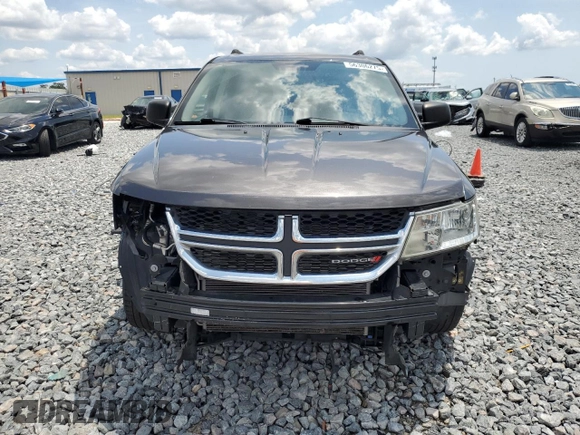 2017 Dodge Journey SE z VIN 3C4PDCAB5HT694834, wystawiony jako Copart lot #56306275 z przebiegiem 75 286 mil mil oraz Szkoda całkowita • Salvage title. Historia ofert i sprzedaży dostępna na DreamBid. Obrazek 5.