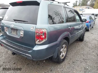 2008 Honda Pilot EX-L with VIN 5FNYF285X8B007693, listed as a IAAI auction lot 41802234 with 187,338 mi miles. Bid and sale history available at carsss.com. Image 4.