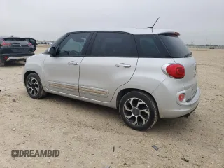 2014 FIAT 500L Lounge with VIN ZFBCFACH9EZ017436, listed as a Copart auction lot 42578185 with 134,621 mi miles and Salvage Title. Bid and sale history available at DreamBid. Image 2.