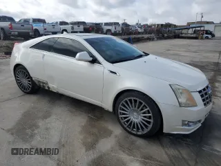 2014 Cadillac CTS Performance with VIN 1G6DG1E35E0190085, listed as a Copart auction lot 84347104 with 142,720 mi miles and Salvage title. Bid and sale history available at DreamBid. Image 4.