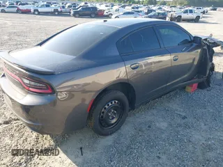2021 Dodge Charger SXT z VIN 2C3CDXBGXMH659892, wystawiony jako IAAI lot #42011248 z przebiegiem 58 005 mil mil oraz . Historia ofert i sprzedaży dostępna na DreamBid. Obrazek 4.