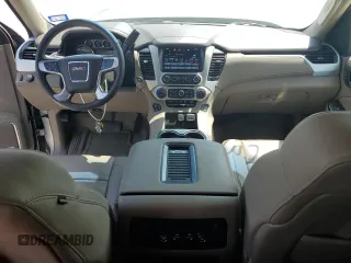 2016 GMC Yukon SLT with VIN 1GKS1BKC1GR413225, listed as a Copart auction lot 66547034 with 56,073 mi miles and Salvage Title. Bid and sale history available at carsss.com. Image 8.