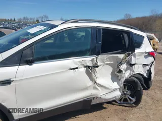 2018 Ford Escape SE z VIN 1FMCU9GD4JUB06181, wystawiony jako IAAI lot #42046708 z przebiegiem 160 987 mil mil oraz . Historia ofert i sprzedaży dostępna na DreamBid. Obrazek 6.