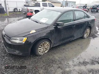 2014 Volkswagen Jetta TDI w/Premium with VIN 3VWLL7AJ1EM406360, listed as a IAAI auction lot 41857580 with 93,333 mi miles and . Bid and sale history available at DreamBid. Image 17.