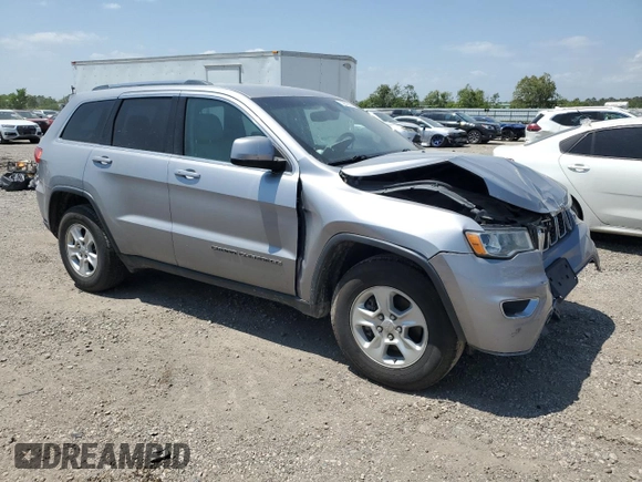 2017 Jeep Grand Cherokee Laredo with VIN 1C4RJEAG0HC816410, listed as a Copart auction lot 52909905 with 102,326 mi miles and Salvage title. Bid and sale history available at DreamBid. Image 4.