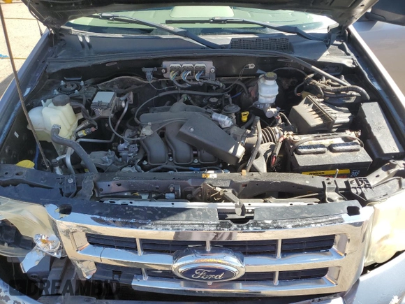 2008 Ford Escape XLT z VIN 1FMCU03158KA50345, wystawiony jako Copart lot #57349735 z przebiegiem 195 316 mil mil oraz Szkoda całkowita • Salvage title. Historia ofert i sprzedaży dostępna na DreamBid. Obrazek 11.