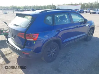 2023 Volkswagen Taos S z VIN 3VVCX7B29PM362983, wystawiony jako IAAI lot #42079717 z przebiegiem 24 408 mil mil oraz . Historia ofert i sprzedaży dostępna na DreamBid. Obrazek 4.