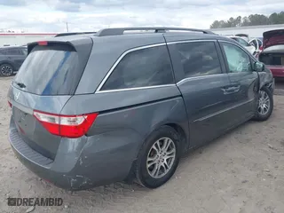 2011 Honda Odyssey EX-L with VIN 5FNRL5H61BB097069, listed as a IAAI auction lot 41723100 with 252,529 mi miles. Bid and sale history available at carsss.com. Image 4.
