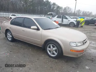 1998 Nissan Maxima GXE z VIN JN1CA21D6WM923286, wystawiony jako IAAI lot #41555099 z przebiegiem 134 005 mil mil oraz . Historia ofert i sprzedaży dostępna na DreamBid. Obrazek 1.